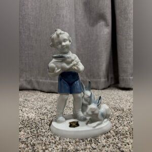 Vintage Gerold Porzellan figurine, specifically the "Boy with Rabbits"